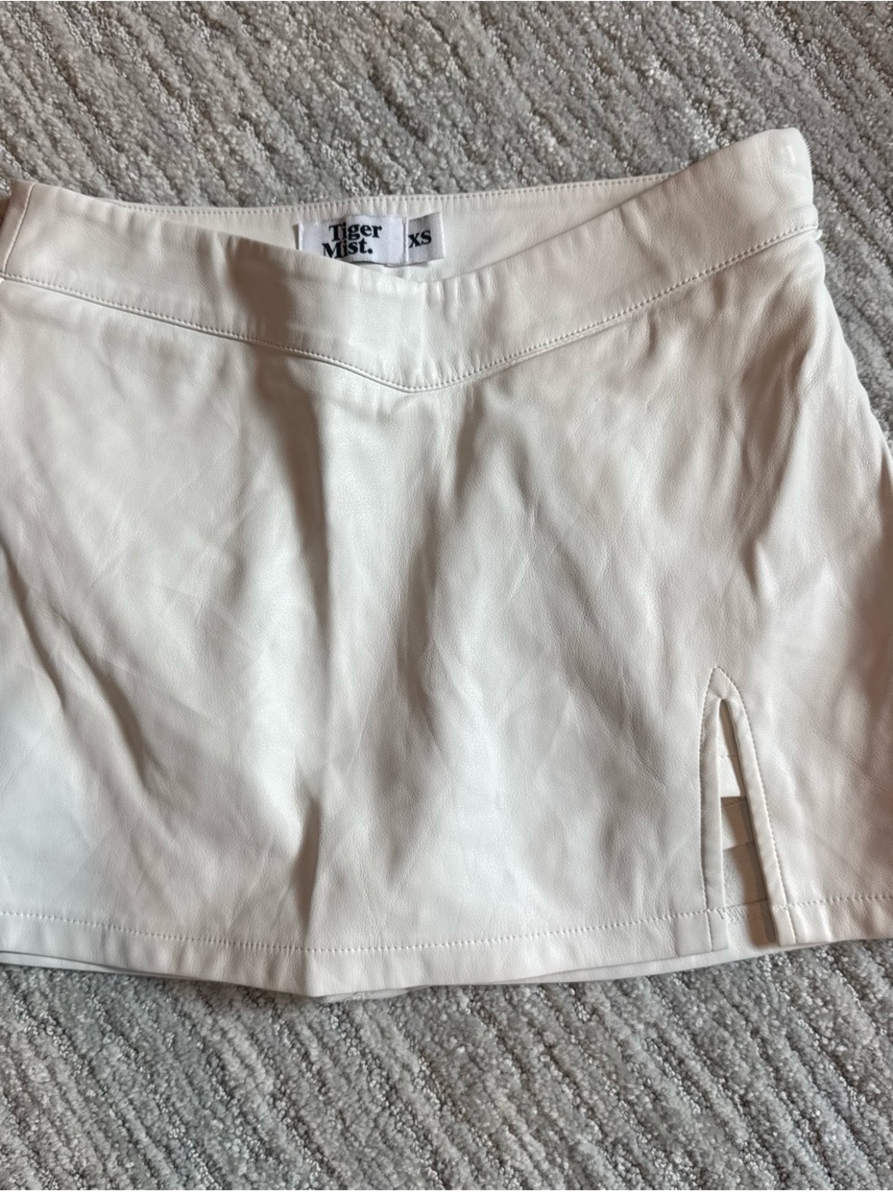 Tiger Mist Cream Faux Leather Mini Skirt with Front Slit built in shorts.